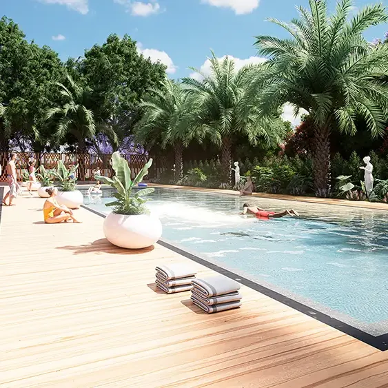 A swimming pool with a timber deck and palms at Amberstone Vectra